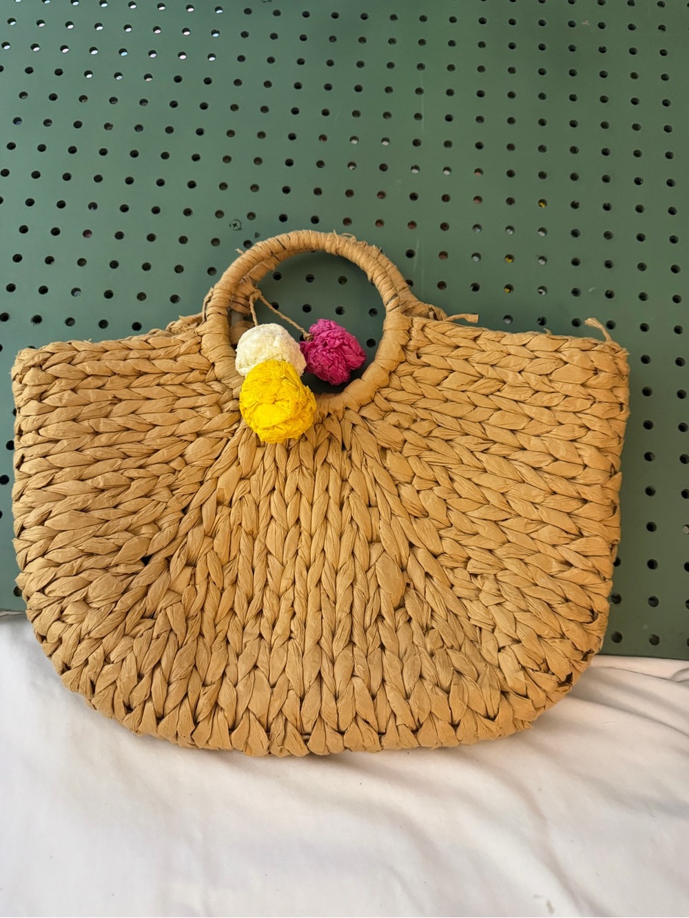 Woven Straw Tote Bag with Colorful Pom-Pom Accents